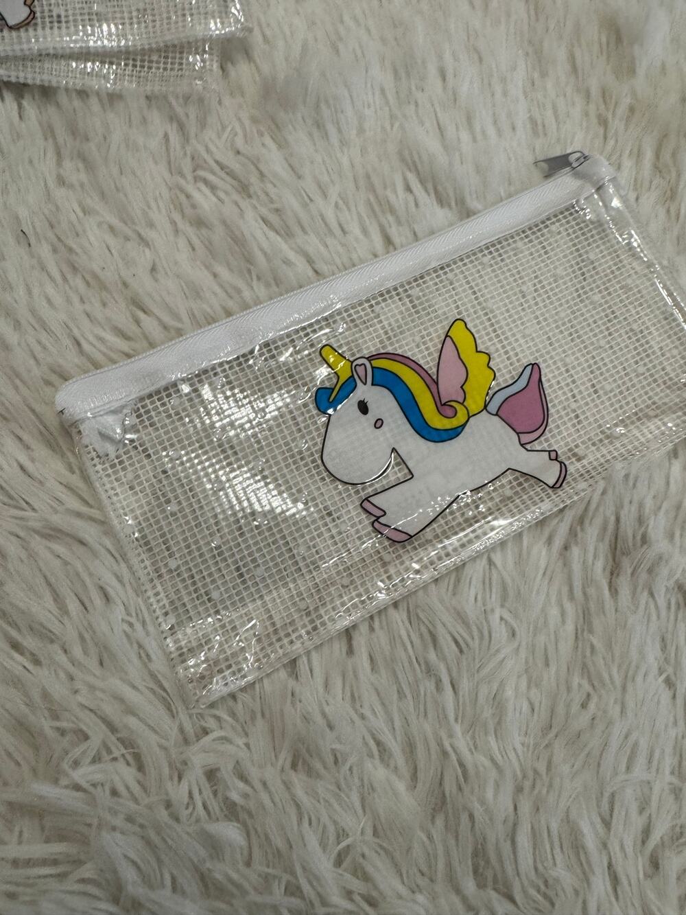 Clear white unicorn pencil case with rainbow mane and wings